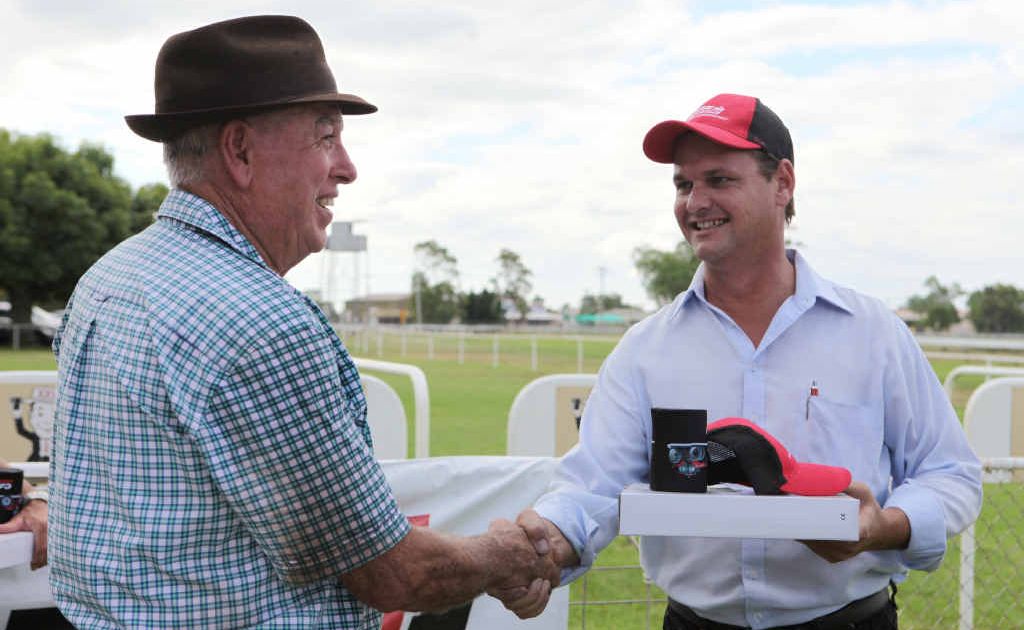Ken Austin accepts the Trainer of the Year award on behalf of son, Todd Austin, at Pioneer Park. Ken Austin accepts the Trainer of the Year award on behalf of son, Todd Austin, at Pioneer Park.